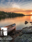 A,Lone,Canoe,On,Shore,At,A,Peaceful,Lake,At
